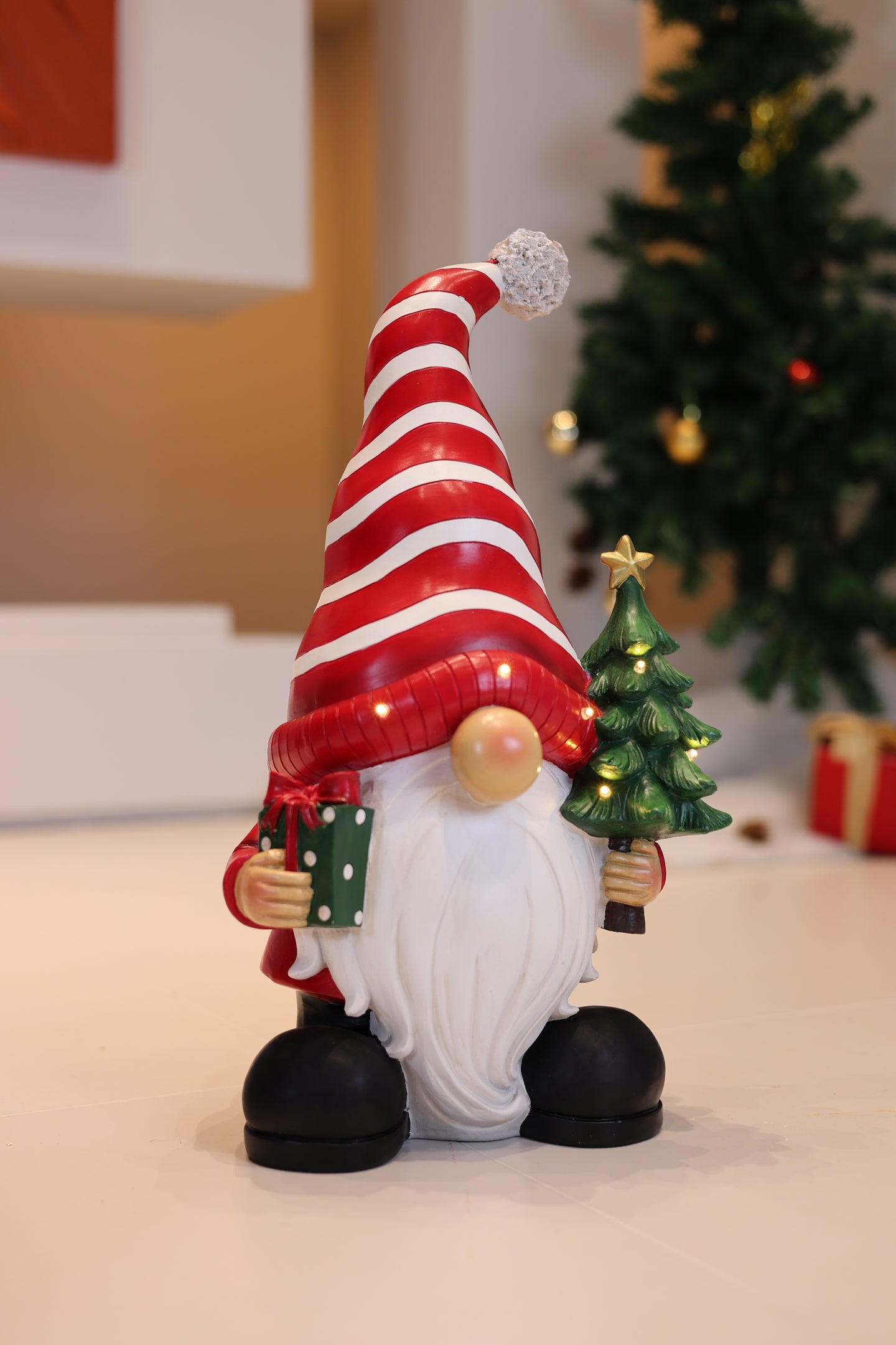 85188-C - Santa Holding Christmas Tree Lighted Christmas Decor Battery Operated Indoor Use Only