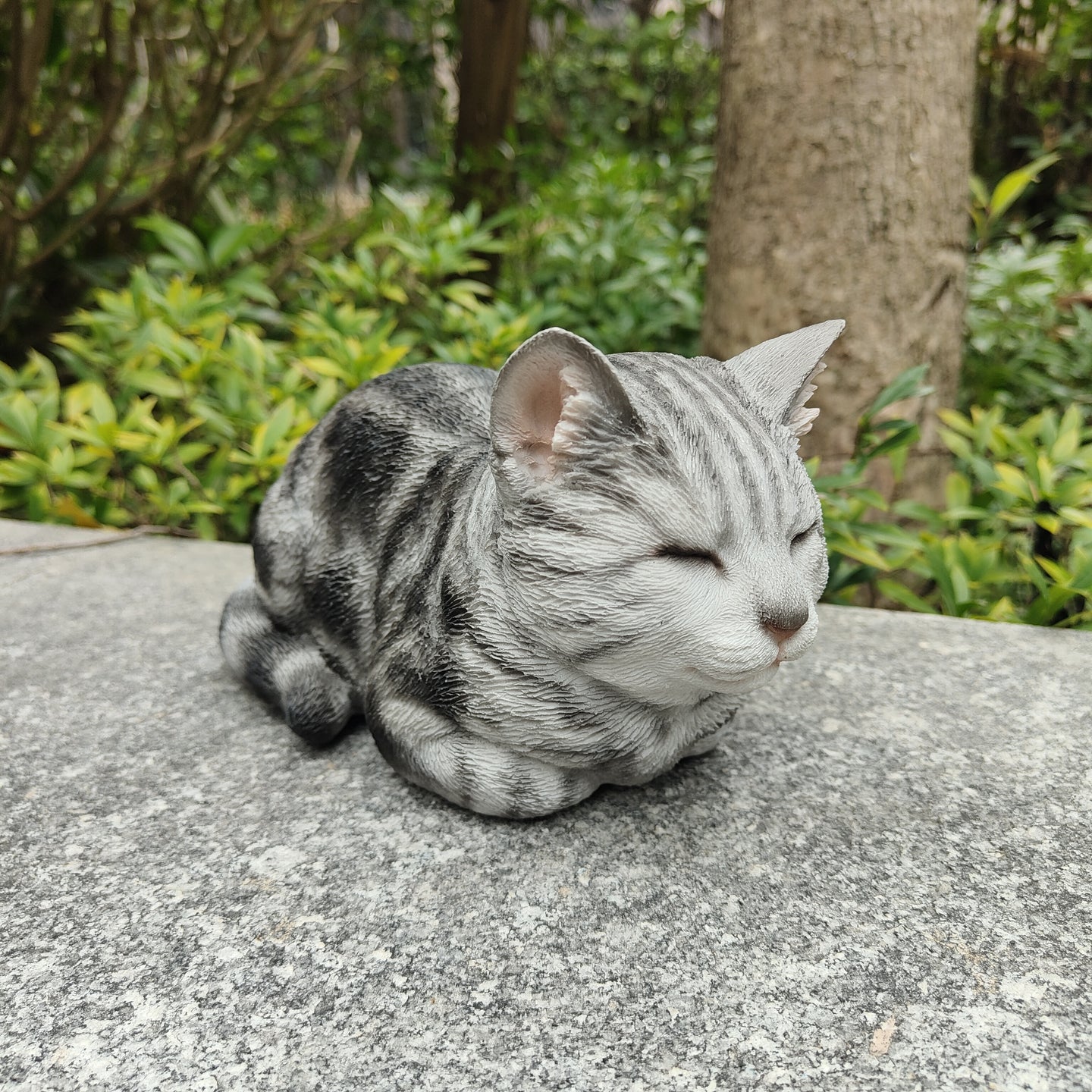 87729-D - Tabby Tranquility: Whimsical Black Polyresin Napping Cat Figurine