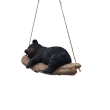 Load image into Gallery viewer, 87957-O - Suspended Cub Serenity: Striking Black Hanging Bear Polyresin Figurine
