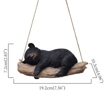 Load image into Gallery viewer, 87957-O - Suspended Cub Serenity: Striking Black Hanging Bear Polyresin Figurine
