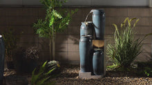 Load and play video in Gallery viewer, 39&quot; H Multi-Tiered Lighted Jug Water Fountain Indoor/Outdoor Use
