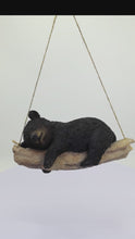 Load and play video in Gallery viewer, 87957-O - Suspended Cub Serenity: Striking Black Hanging Bear Polyresin Figurine
