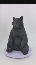 Load and play video in Gallery viewer, 87957-P - Onyx Guardian: Majestic Black Polyresin Sitting Bear Figurine
